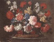 Still life of various flowers in a wicker basket,upon a stone ledge unknow artist